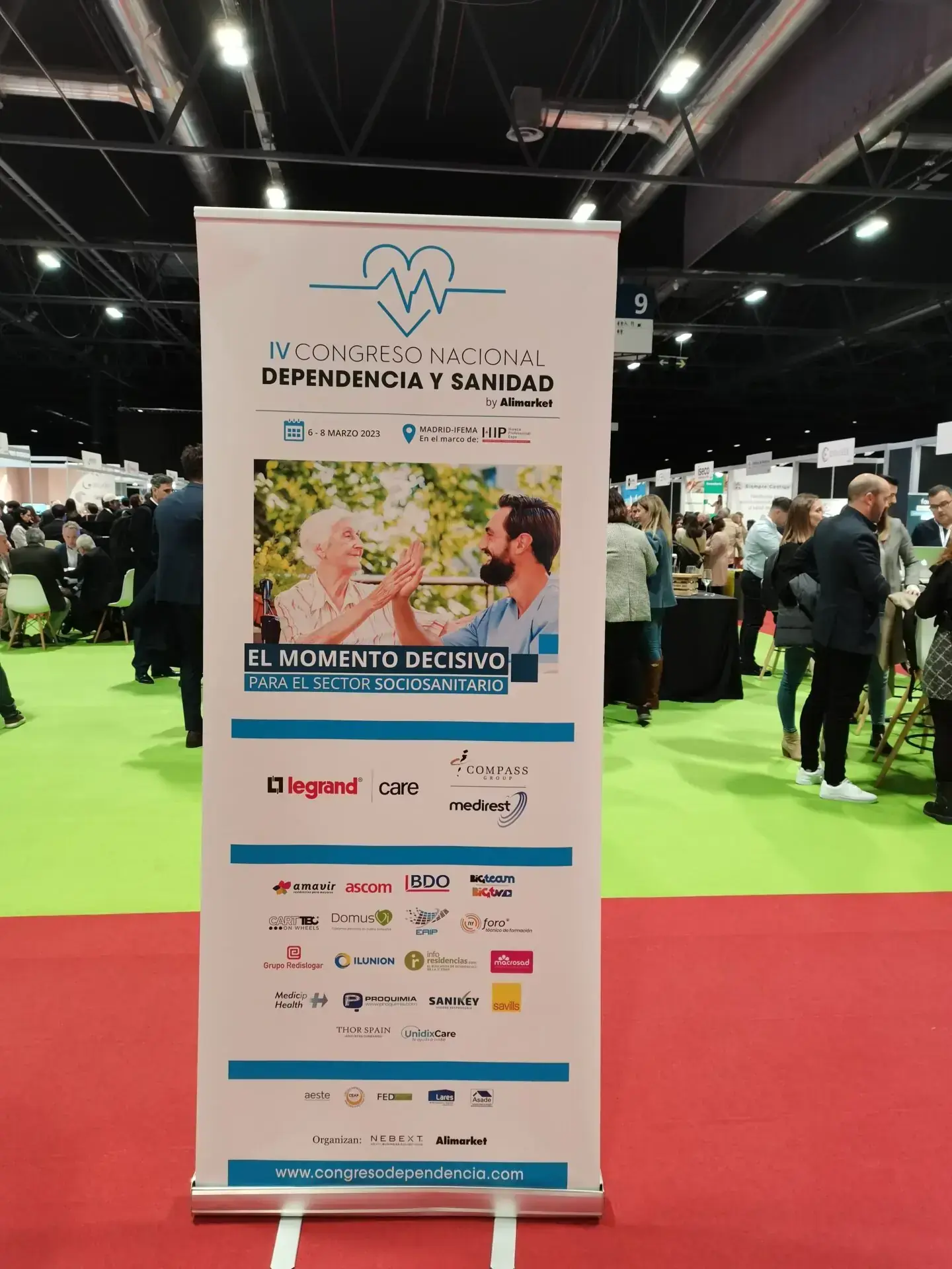 Banner of the «Dependencia y Sanidad» national congress in the exhibition hall